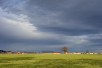 Panoramic agricultural scenery in Bavaria at evening time