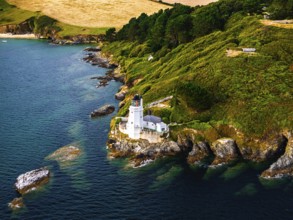 St Anthony Lighthouse from drone, Roseland peninsula, Head circular walk, Cornwall, UK