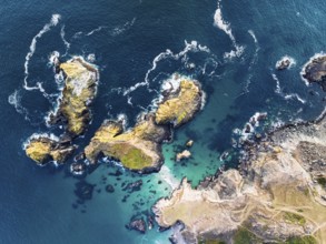 Top Down view over Kynance Cove from a drone, Mount's Bay, Lizard Point, Cornwall, England, United