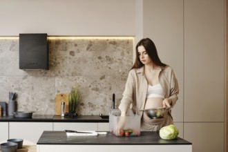 A pregnant woman is engaged in meal preparation in a contemporary kitchen. She sorts colorful