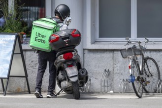 Uber Eats motorbike courier, Interlaken, Switzerland