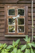 Window with decoration, wooden window, historic, wooden house, Bissendorf, Lower Saxony, Germany