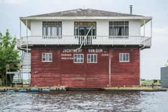 Wooden house, old shipyard in Leiden, Holland