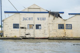 Wooden house, old shipyard in Leiden, Holland