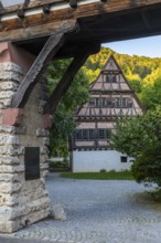 Monastery complex, Tor tor to the monastery courtyard, monks' bathhouse, half-timbered building,