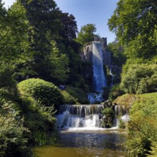 Water features at the equaduct with the highest artificial waterfall in a landscaped garden,