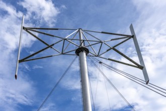 Vertical axis wind turbine, Darrieu wind turbine, 2 vertically mounted rotors rotate around the