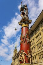 Beautiful Old City with Old Building and Statue and Church Tower in a Sunny Summer Day in City of