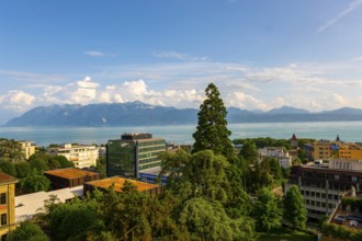 Cityscape and Lake Geneva with Mountain View in a Sunny Summer Day in Lausanne, Vaud, Switzerland