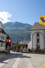 Beautiful Catholic Parish Church of St Peter and Paul in Old Town with Mountain and Blue Sky in a