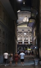 Beautiful Bundeshaus Illuminated Parliament Building or Federal Palace and a Street with People at