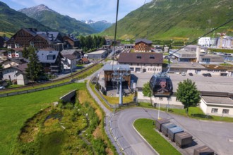Beautiful View From Overhead Cable Car and Station and over Cityscape and Railroad Station with