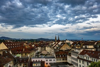 Panoramic Beautiful Cityscape and Cathedral Tower in Sunset with Cloudscape in City of Bern, Canton