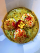 Grilled Saint-Jacques on a Mango and Passion Fruit Puree with Gorbuscha Salmon Roe Decorated with