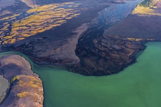 Mountain landscape, river, river delta, river course, lake, volcanic landscape, sunny, aerial view,
