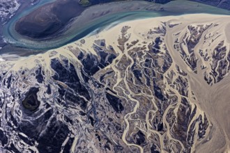 Mountain landscape, river, river delta, river course, volcanic landscape, sunny, aerial view,