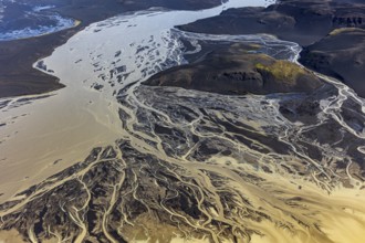 Mountain landscape, river, river delta, river course, volcanic landscape, sunny, aerial view,