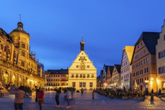 Market square, town hall and council drinking parlour in Rothenburg ob der Tauber at dusk, Bavaria,