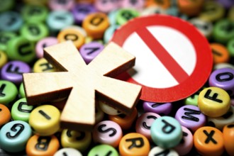Gender star and prohibition sign on letters