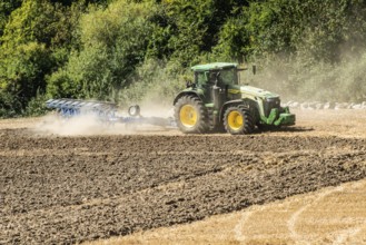 Autumn plowing with tractor in Borrie, Ystad municipality, Skåne county, Sweden, Scandinavia
