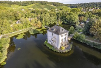 The Trappenseeschlösschen in the Trappensee in Heilbronn seen from the air, Baden-Württemberg,