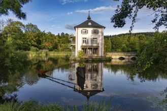 The Trappenseeschlösschen in the Trappensee in Heilbronn, Baden-Württemberg, Germany