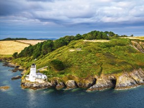 St Anthony Lighthouse from drone, Roseland peninsula, Head circular walk, Cornwall, UK