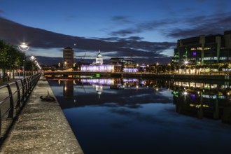 Buildings reflected in the River Liffey, night shot, Dublin, Ireland