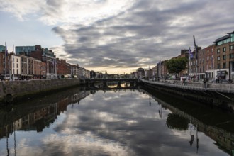 Cloudy mood at the river Liffey, reflection, Dublin, Ireland