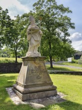 Saint Liborius, stone statue on a pedestal with inscription, parish church of St Maximilian,