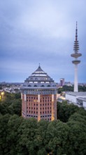 Aerial view of the Schanzenturm in Sternschanzenpark at the Blue Hours with Heinrich Herz Tower,