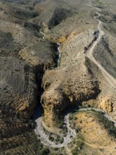 Bird's eye view of a hilly, dry landscape with recognisable paths, aerial view, Angel's Canyon,