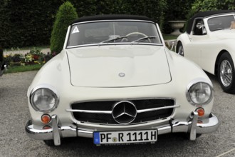 Mercedes-Benz 190 SL cabriolet, Vintage car, Classic white Mercedes convertible vintage car in an