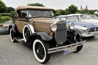 Ford A, Ford classic car, Brown-black convertible in classic style on a gravelled square, Retro