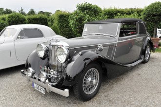 Jaguar MK IV, classic car, Elegant, black convertible classic car with classic design at a car