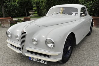 Alfa Romeo 6C 2500 SS Touring, classic car, grey retro sports car model with elegant lines at a car