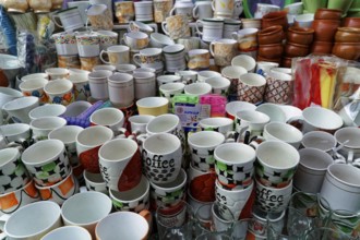 Udaipur, Rajasthan, North India, Asia, Large collection of stacked cups and dishes with colourful