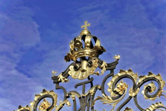 Prague, Czech Republic, Europe, Detailed decorated Tor tor with golden crown and cross in front of