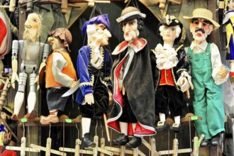 Prague puppets, Prague, Czech Republic, Europe, Differently dressed puppets lined up, colourful and