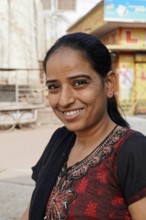 Kota, Rajasthan, North India, Asia, Portrait of a smiling woman with a friendly expression in