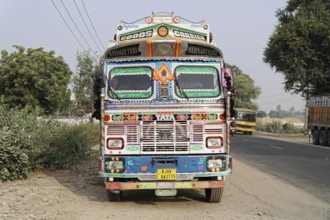 Kota, Rajasthan, North India, Asia, Decorated Indian lorry with detailed decoration on a country