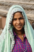Sawai Madhopur, Kota, Rajasthan, North India, Asia, Woman with green headscarf and colourful shirt