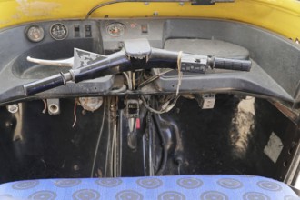 Kota, Rajasthan, North India, Asia, Interior view of an old vehicle with view of steering wheel and
