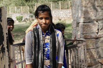 Kota, Rajasthan, North India, Asia, Young woman in traditional clothes looking into the camera,