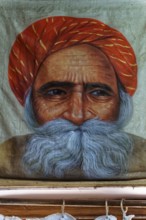 Painting, Sale, Souvenir, Udaipur, Rajasthan, India, Asia, Close-up of an elderly man with red