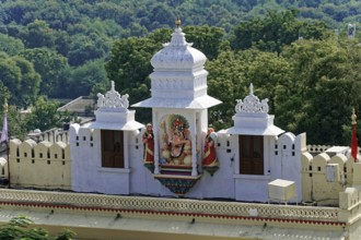 City Palace, Udaipur, Rajasthan, India, Asia, Traditional temple building with decorative statue