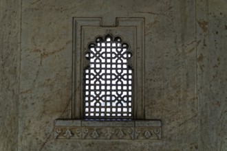 City Palace, Udaipur, Rajasthan, India, Asia, Decorated window with lattice pattern in a stone