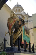 Udaipur, Rajasthan, North India, Asia, Magnificently decorated elephant statue next to an