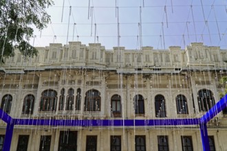 Udaipur, Rajasthan, North India, Asia, Building with decorative fairy lights and blue curtains for