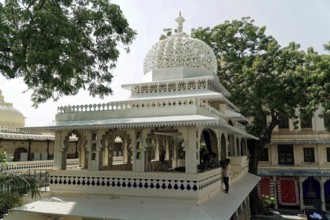 Udaipur, Rajasthan, North India, Asia, White pavilion with ornate decorations and surrounded by